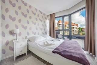 Апартаменты Apartamenty Sun & Snow Horyzont Мендзыздрое Апартаменты с террасой-2